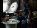 Ha Giang - Woman preparing Bánh cuốn (rolled cake) for breakfast